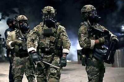 Portland police use tear gas after declaring riot for second night