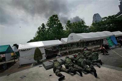 Riots erupt after Thai protest leaders surrender