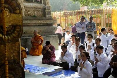 Devotees throng Bodh Gaya temple as it reopens to public
