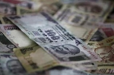 Rupee tanks 48 paise to 1-month low of 61.13 vs US dollar