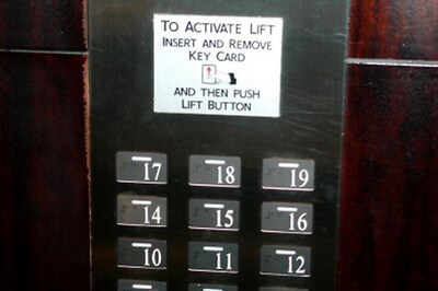 Minor Drives Car in Reverse, Falls in Elevator Shaft, Dies