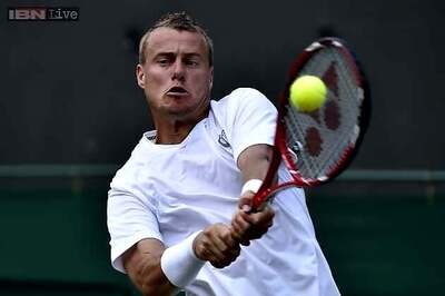 Lleyton Hewitt, Ivo Karlovic advance to Newport final