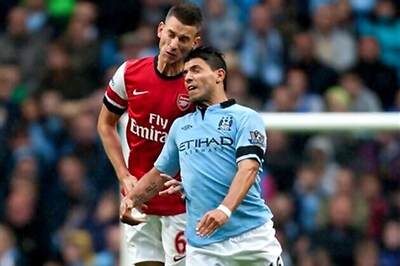 Spirited Gunners earn draw against Man City