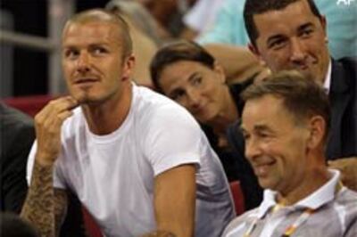 London takes the baton for more modest 2012 Games