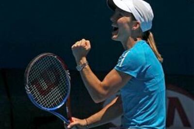 Henin advances to semis in Grand Slam comeback