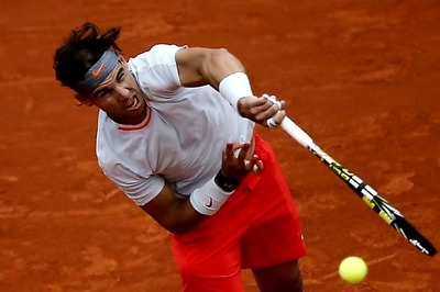 Shaky Nadal advances to round three in Paris
