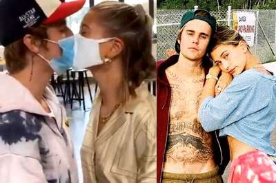 Justin Bieber and Hailey Baldwin Share a Kiss with Their Masks on