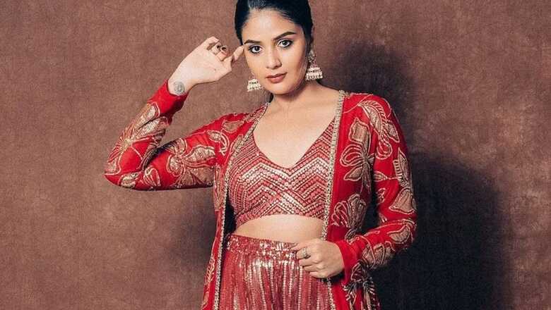 Actress Sreemukhi Shines In Red Lehenga During Bholaa Shankar Promotions