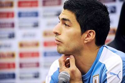 Luis Suarez says he won't change his game on return from bite ban