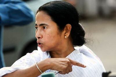 Mamata dares adversaries to fight her politically