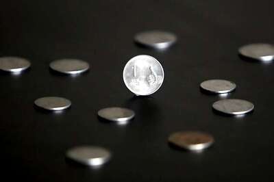 Rupee up by 8 paise against dollar in early trade