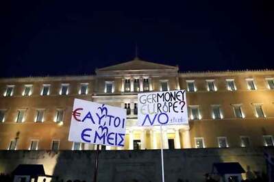 Few signs of market panic as Greece nears default