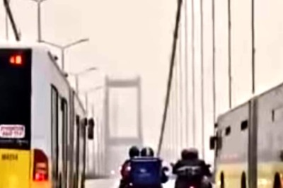 Watch: Bus Drivers Help Delivery Boys Cross Bridge During Heavy Storm