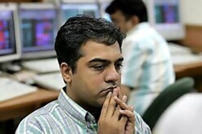 Sensex closes above 10,000 pts