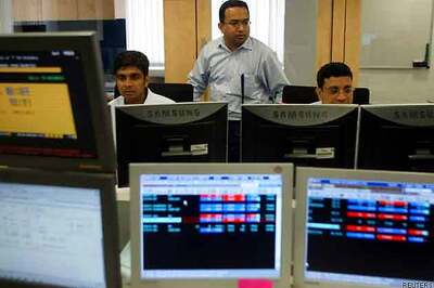 Sensex, Nifty end marginally lower